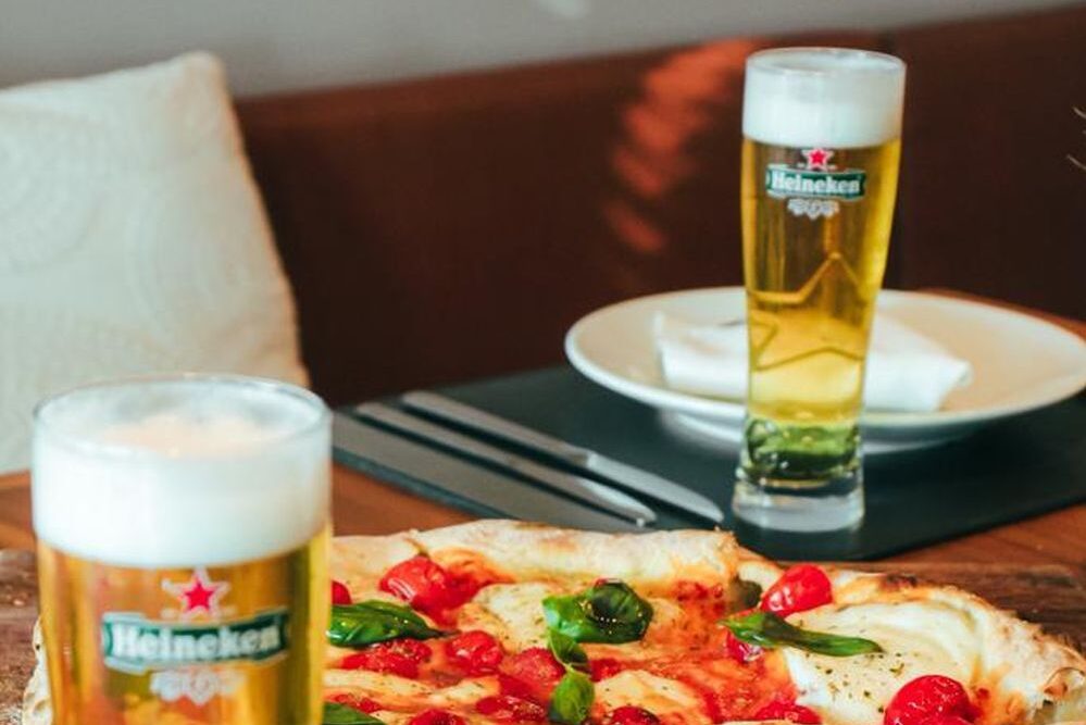 Chopp Heinekein e pizza